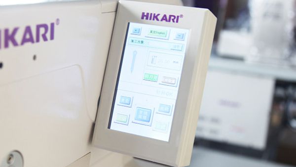 Mesin Lubang Kancing Eyelet Terkomputerisasi